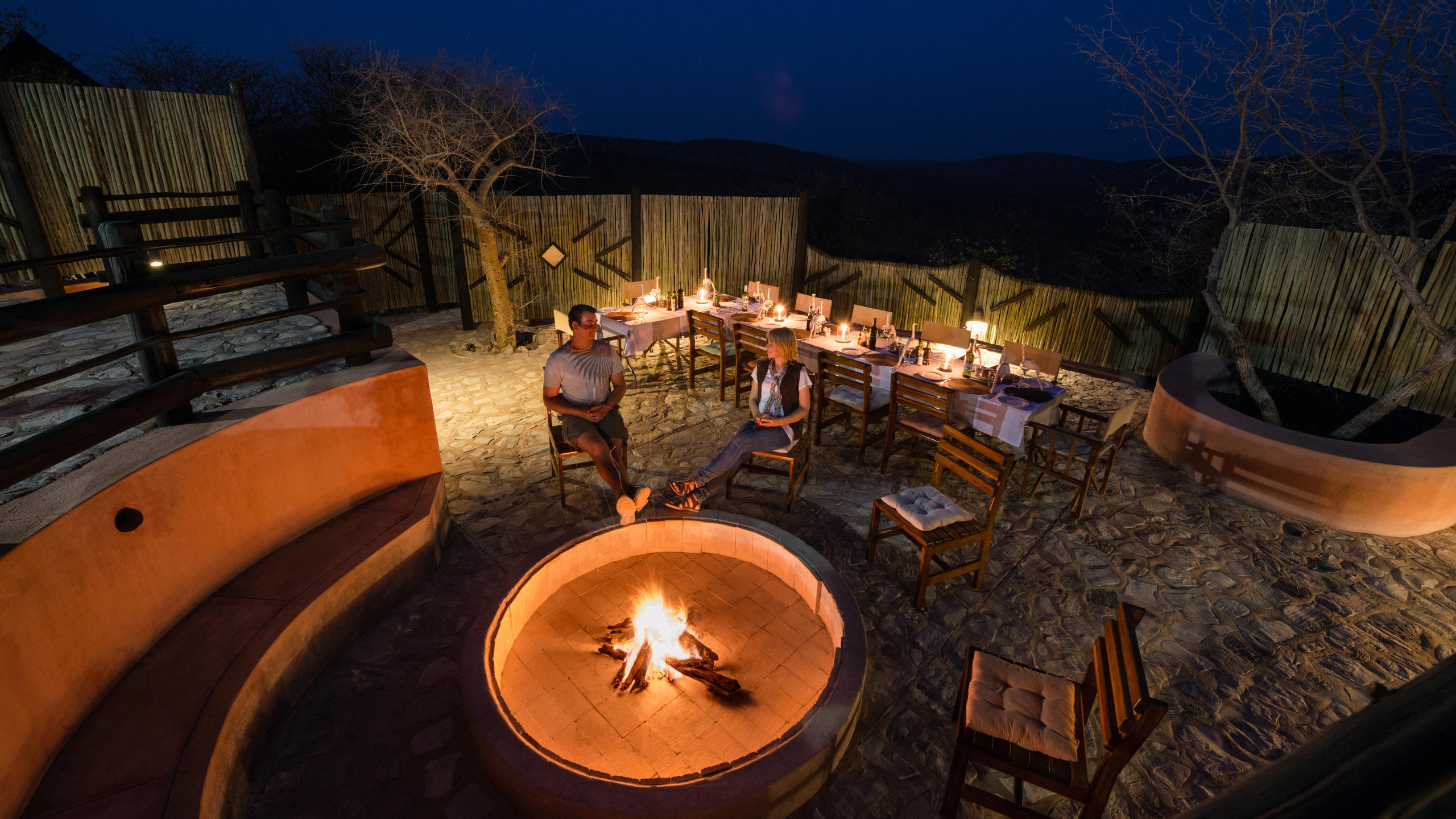 Cozy indoor fireplace and lounge area at the lodge