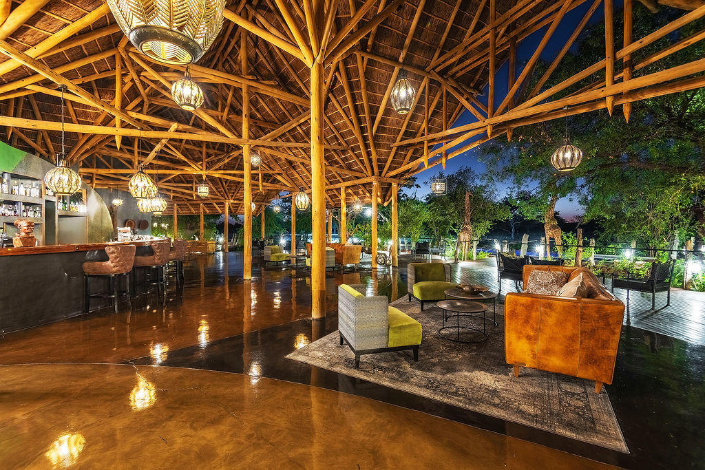 Luxury suite interior bedroom with mosquito net and lounge area