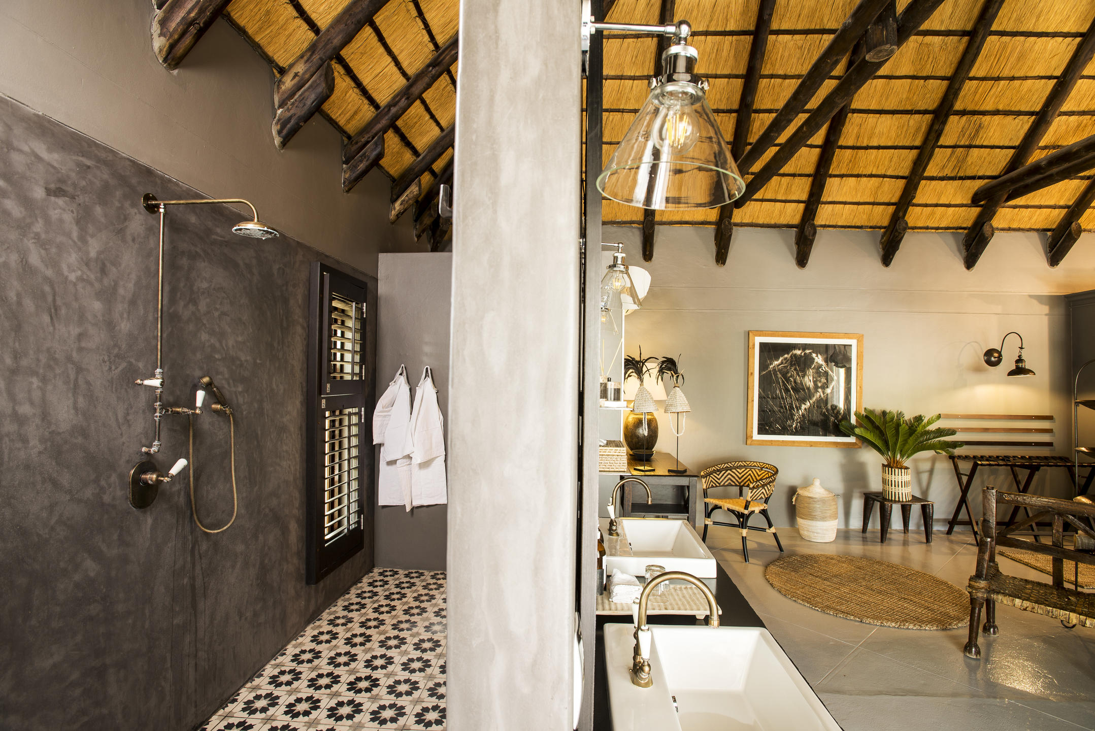 En-suite bathroom with bathtub and inside shower